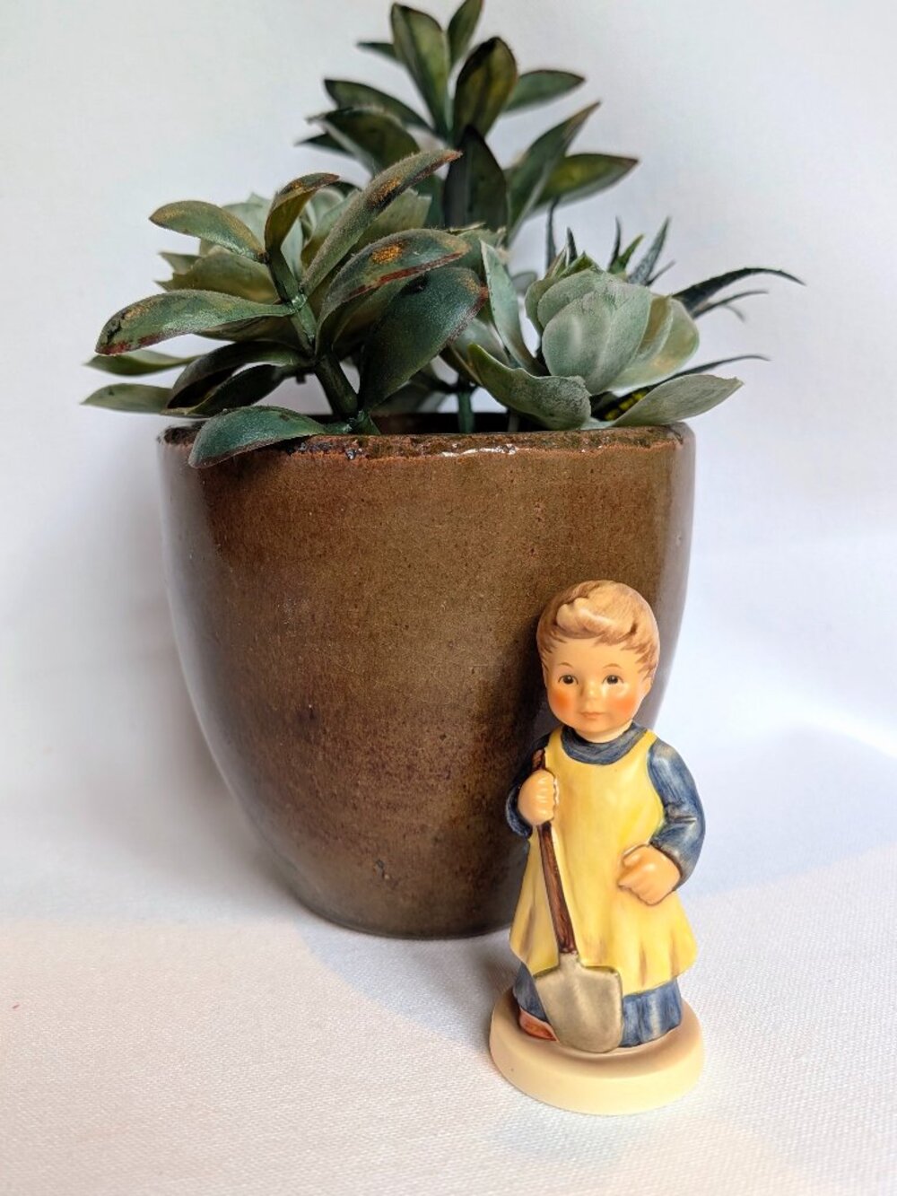 M.I. Hummel figurine is titled "Garden Treasures" - #727